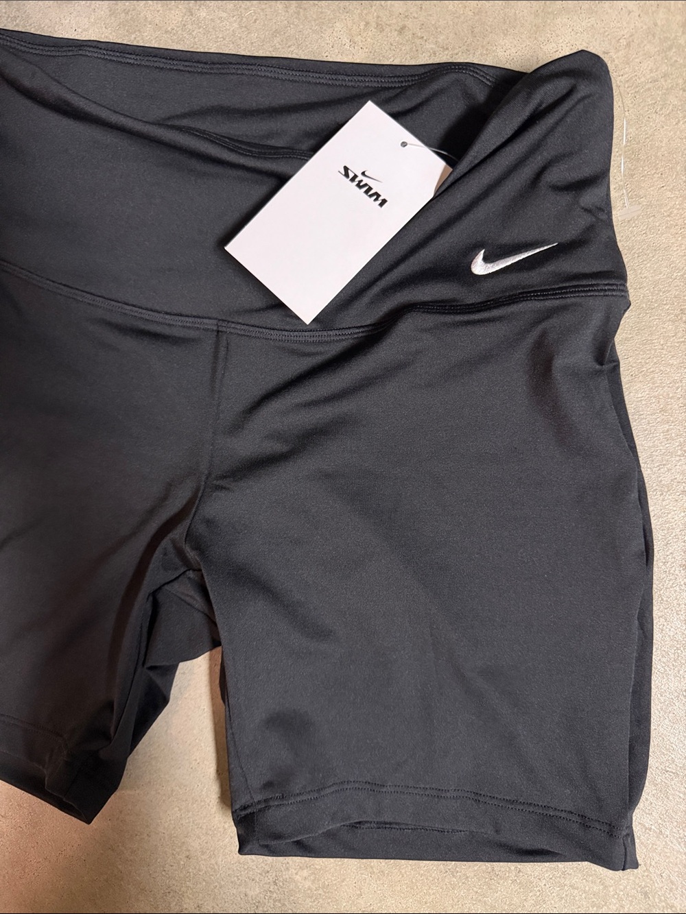 Nike Black Top with White Swoosh Logo